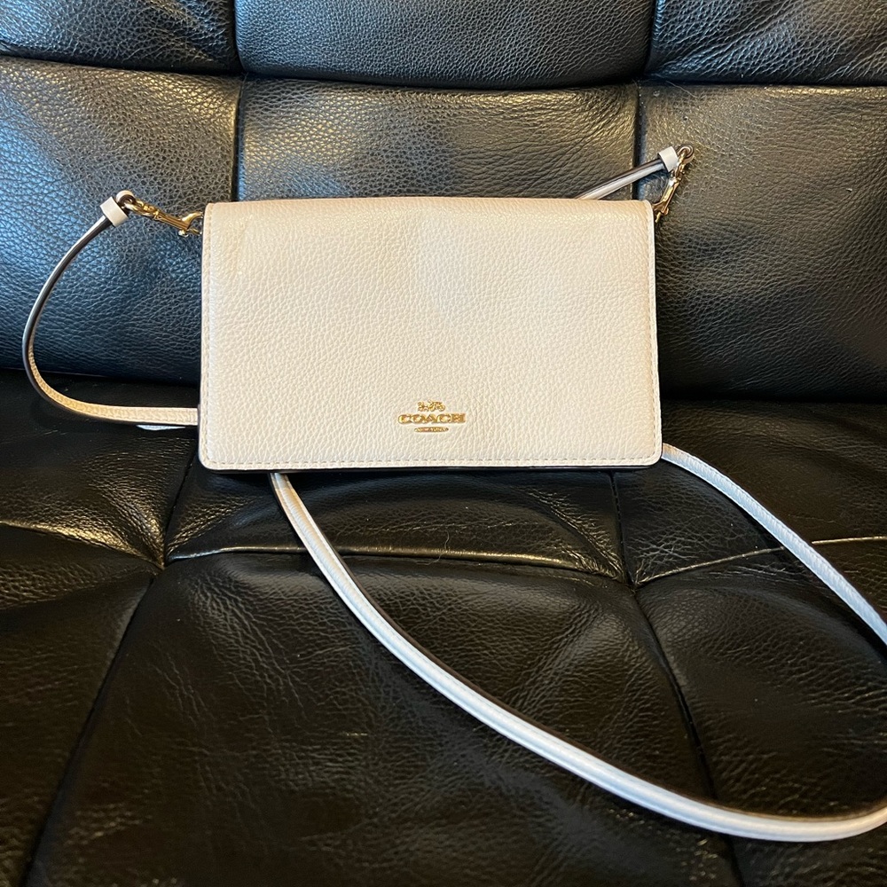 White coach flap front crossbody.